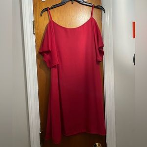 Medium red dress, peek a boo shoulders. Short sleeves